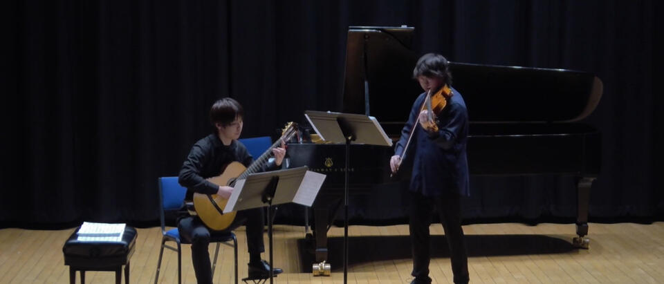 Jiujiu Wu with Xinlin Wang Playing Guitar and Viola Chamber music at New England Conservatory Jiujiu Wu wiith Xinlin Wang Playing Guitar Viola Chamber music at New England Conservatory