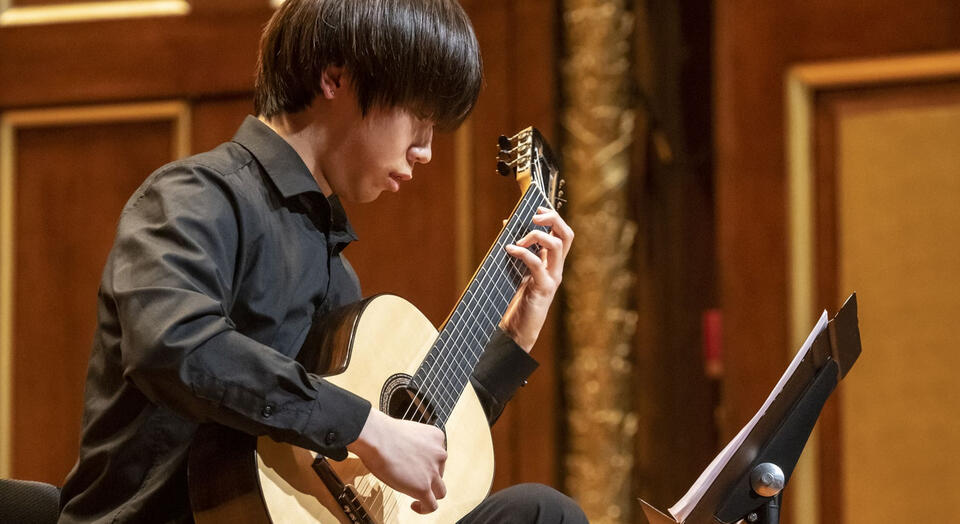 Jiujiu Wu performing at the New England Conservatory Jiujiu Wu performing at the New England Conservatory