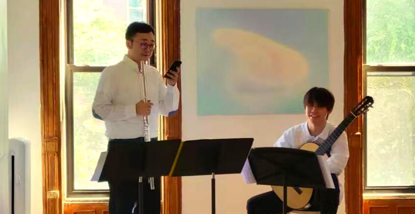 Jiujiu Wu with Zuoliang Liu Playing Guitar and Flute Concert at Fou Gallery Jiujiu Wu with Zuoliang Liu Playing Guitar and Flute Concert at Fou Gallery