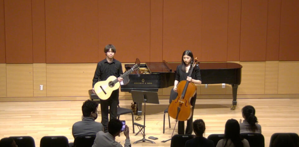 Jiujiu Wu with Angela Sun Playing Guitar and Cello Chamber music at New England Conservatory Jiujiu Wu with Angela Sun Playing Guitar and Cello Chamber music at New England Conservatory